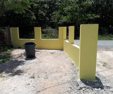 Fence posts set and finished ready for panels at a property entrance